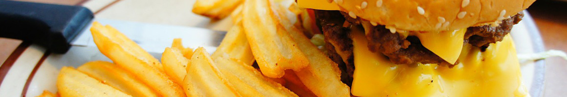 Eating Burger at Tommys Hamburger Grill restaurant in Fort Worth, TX.